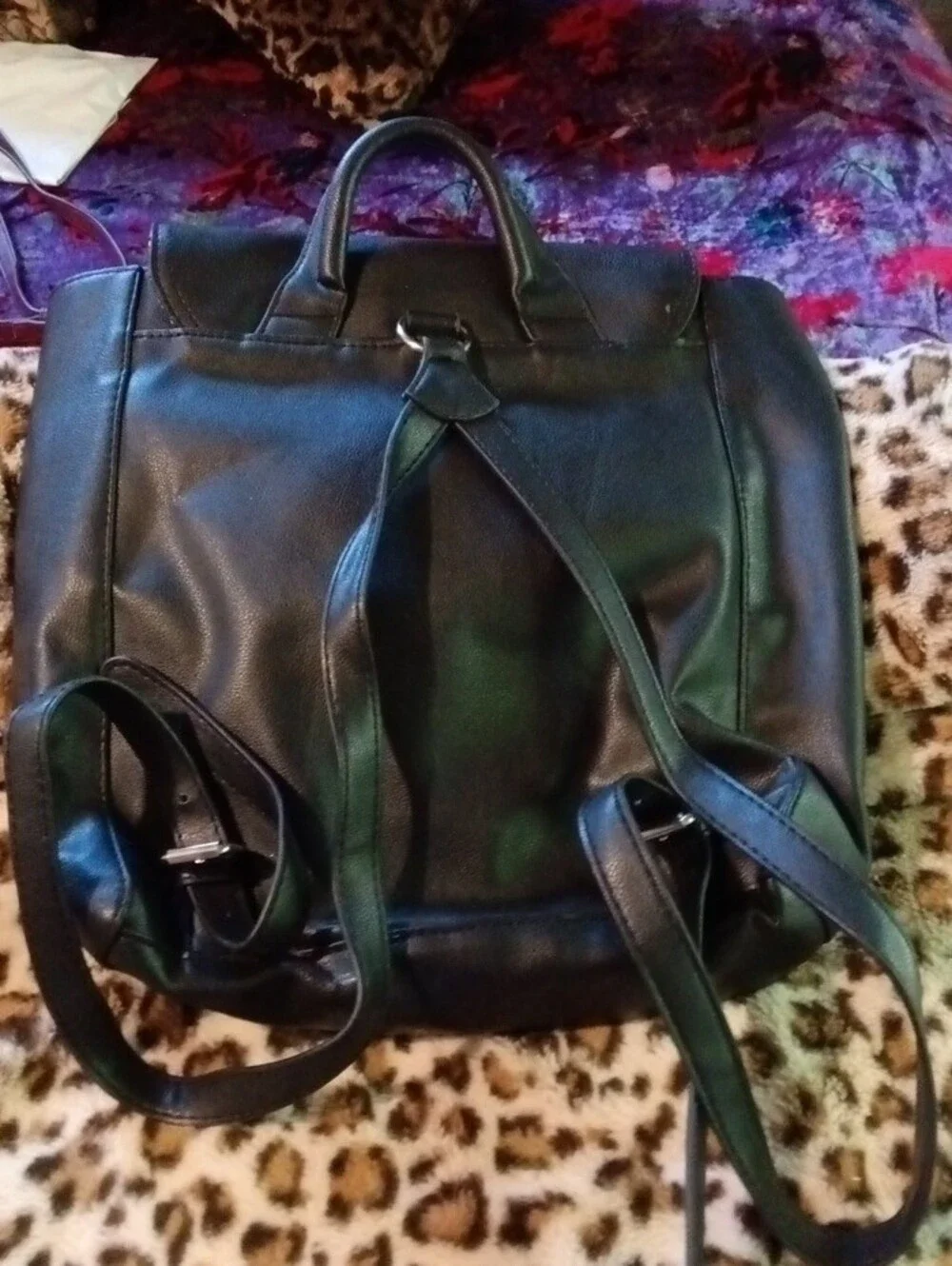 Minimalist Black Faux-Leather Backpack with Front Zip Detail